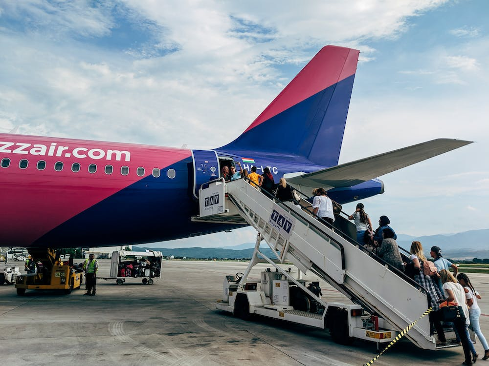 economy class passengers boarding a flight