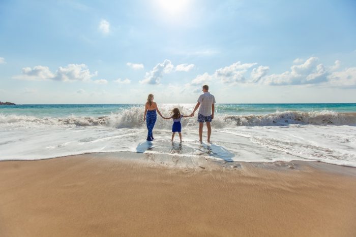 A family enjoying the beach