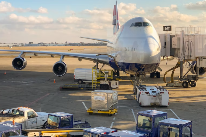 Plane at the airport, ready to be boarded.